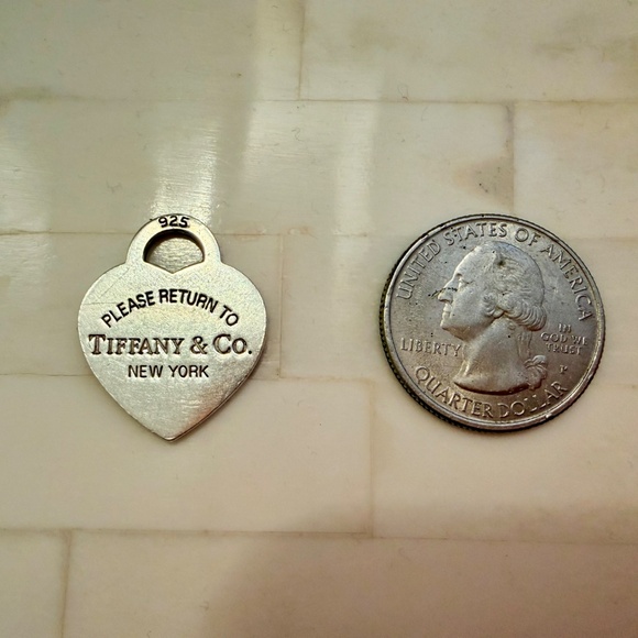 Tiffany & Co. Sterling Silver Rerun to Tiffany Charm - Picture 4 of 4